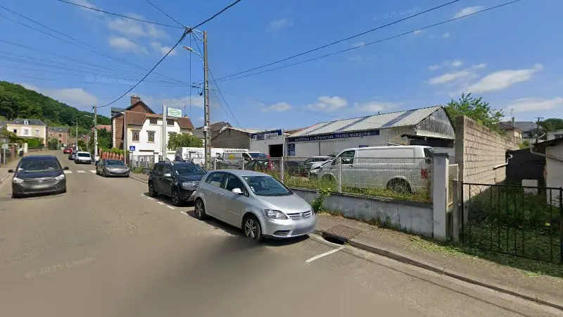 Vue de la rue devant Top garage TEAMCO, Le Houlme