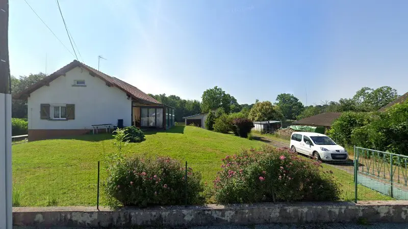 Vue de la rue devant Carrosserie Cotaise, La Côte