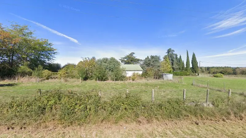 Vue de la rue devant Carrosserie Laroudie, Dun-le-Poëlier
