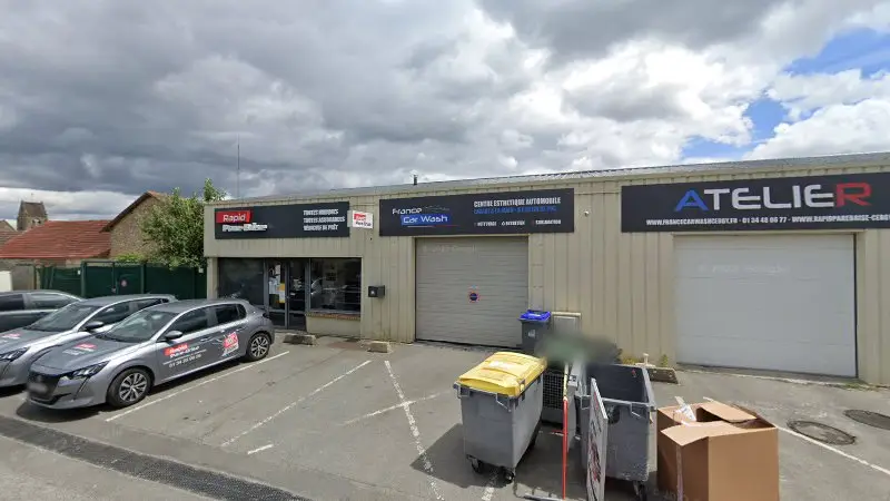 Vue de la rue devant Promos Pneus Autozen, Puiseux-Pontoise
