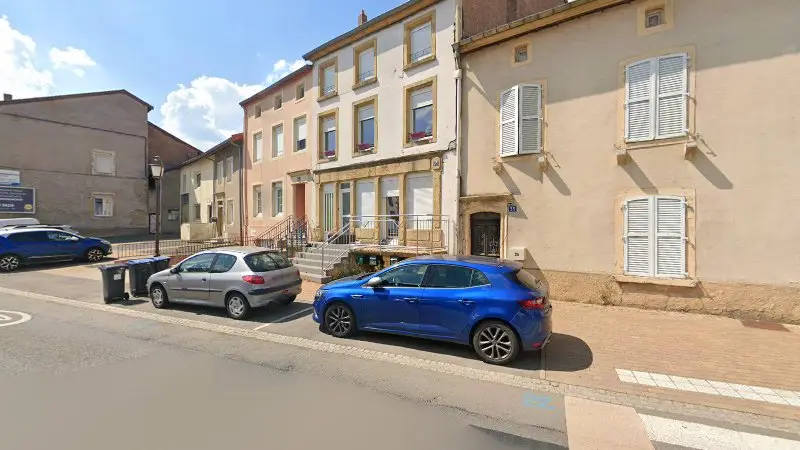 Vue de la rue devant Change Tes Pneus À Domicile, Metzervisse