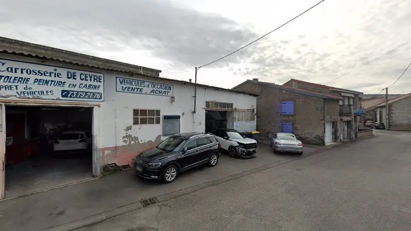Vue de la rue devant Carrosserie De Ceyre, Blanzat