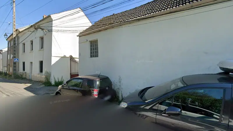 Vue de la rue devant SMF Carrosserie, Goussainville