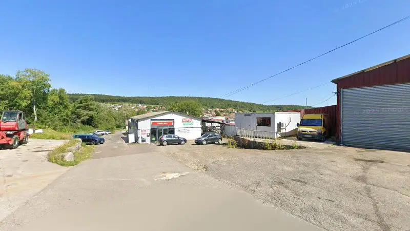 Vue de la rue devant Garage Poids Lourds Roulanais, Roulans
