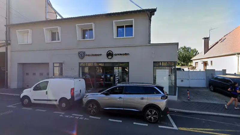 Vue de la rue devant GARAGE DE L'EGLISE Peugeot, Châtillon