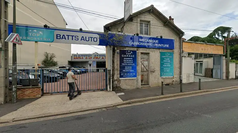 Vue de la rue devant TOP CARROSSERIE - GARAGE BATTS AUTO, Argenteuil