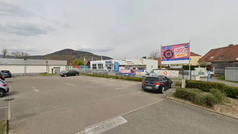 Vue de la rue devant Ac Pneus Et Services, Soultz-Haut-Rhin