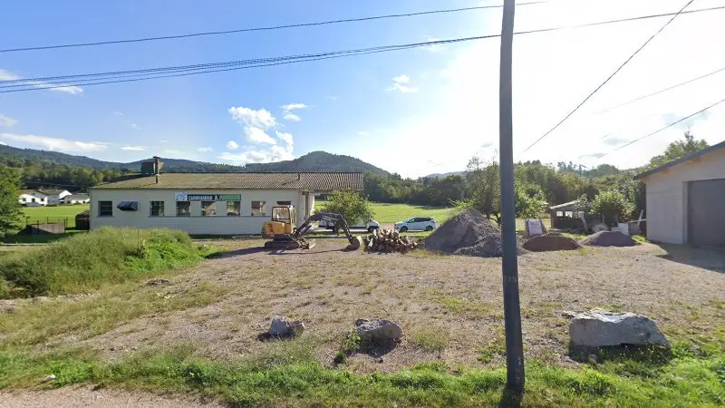 Vue de la rue devant Carrosserie Fournier, Vagney