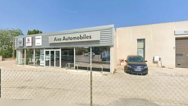Vue de la rue devant SARL AXE AUTOMOBILE Volkswagen, La Seyne-sur-Mer