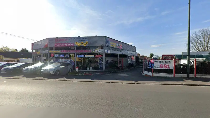 Vue de la rue devant Auto Invest, Pièces, Pneus et Entretien Auto, Vigneux-sur-Seine