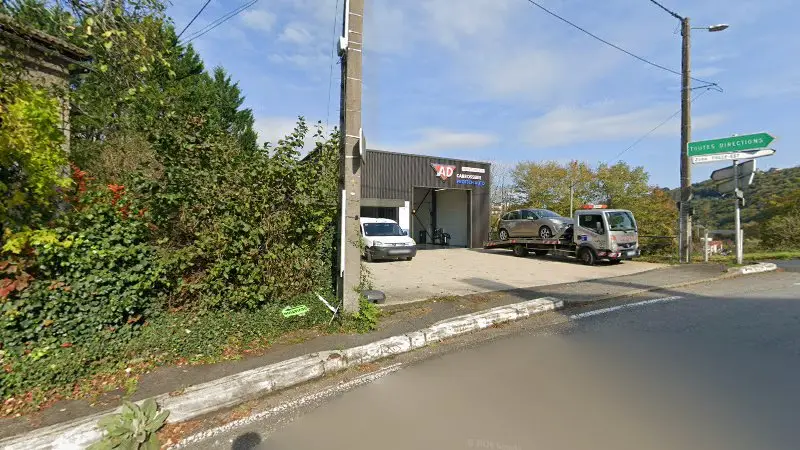 Vue de la rue devant Point Relais Ad Carrosserie protech Auto, Tulle