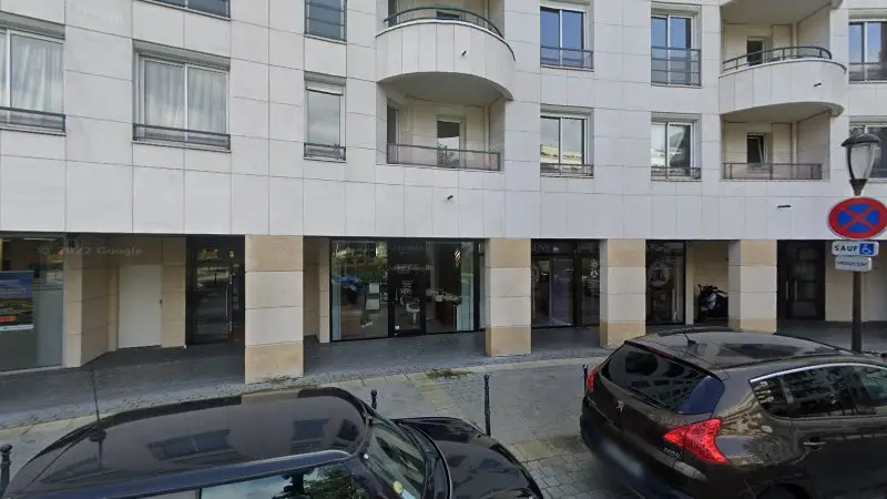 Vue de la rue devant Rade Auto Depannage, Boulogne-Billancourt