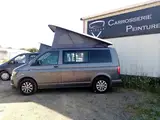 Photo de CARROSSERIE IRISCAR, Pose toit relevable, carrosserie, peinture, aménagement van et utilitaire